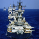 Illustration for article titled Nuclear Cruisers And Battleships: Check Out This Reagan Era Navy Photo